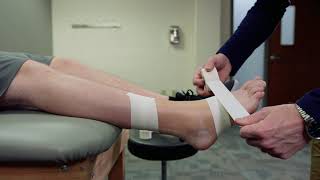 Achilles Tendon Taping Skills Video [upl. by Hras84]